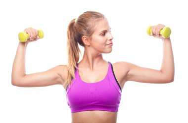 Dumbbells ile genç güzel kadın