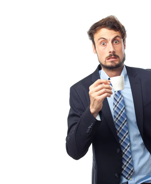 Young crazy businessman having a coffee — Stock Photo, Image