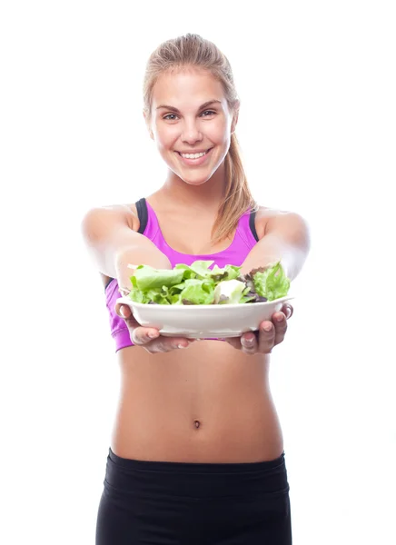 Young cool woman with a salad — Stock Photo, Image