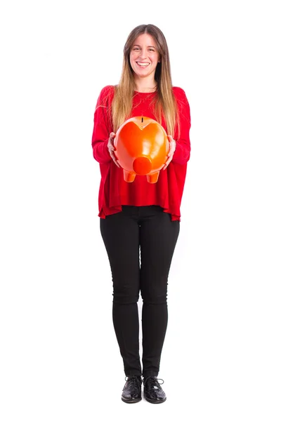 Young cool girl with a piggy bank — Stock Photo, Image