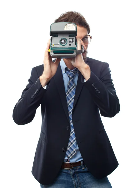 Young crazy businessman taking a photo — Stock Photo, Image