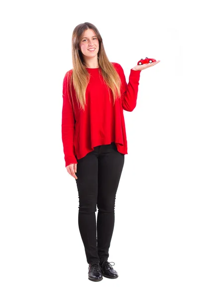 Young cool girl with a car toy — Stock Photo, Image