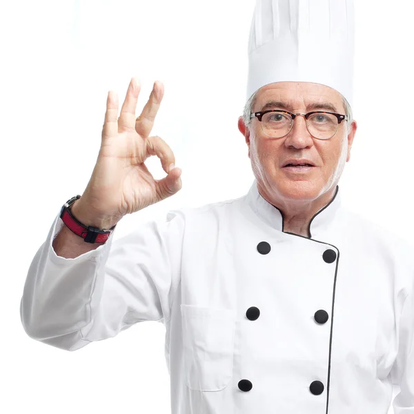 Senior onhartelijk mens chef oke gebaar — Stockfoto