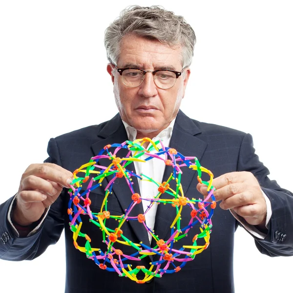 Senior cool man playing with a toy — Stock Photo, Image