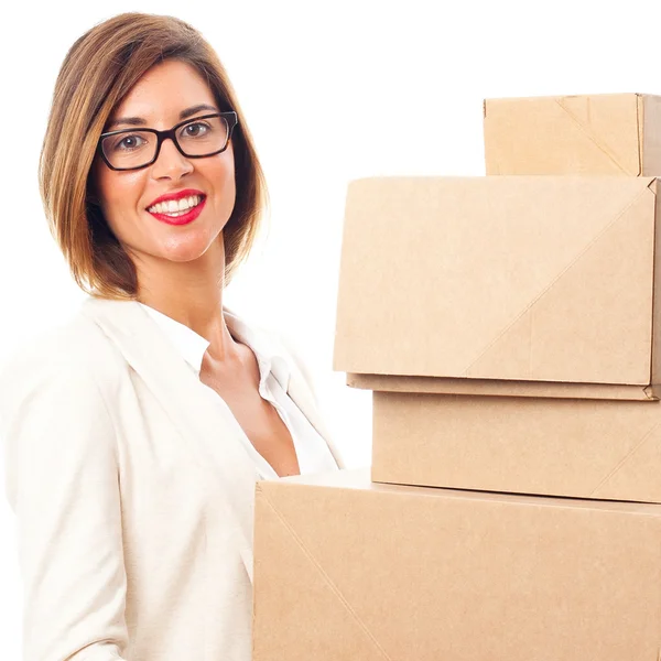 Young cool woman with boxes — Stock Photo, Image