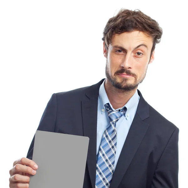 Young crazy businessman holding a gray card — Stock Photo, Image