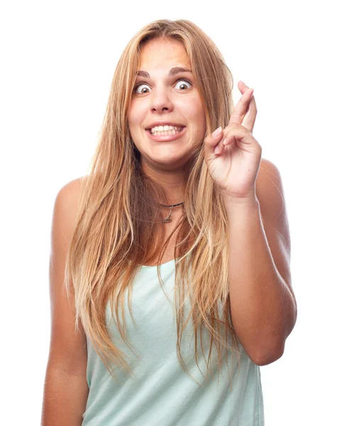 Young cool woman finger crossing — Stock Photo, Image