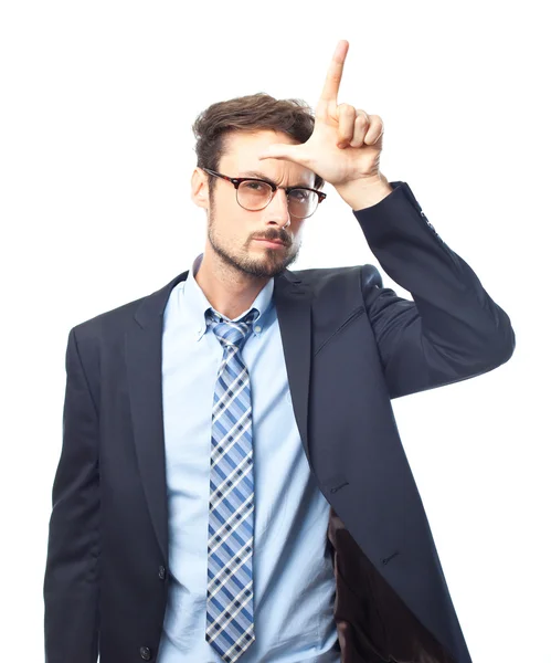 Young crazy businessman loser gesture — Stock Photo, Image