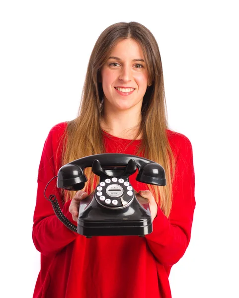Young cool girl with a telephone — Stock Photo, Image