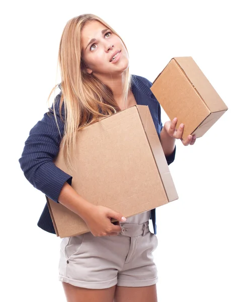 Young cool woman with boxes Stock Image