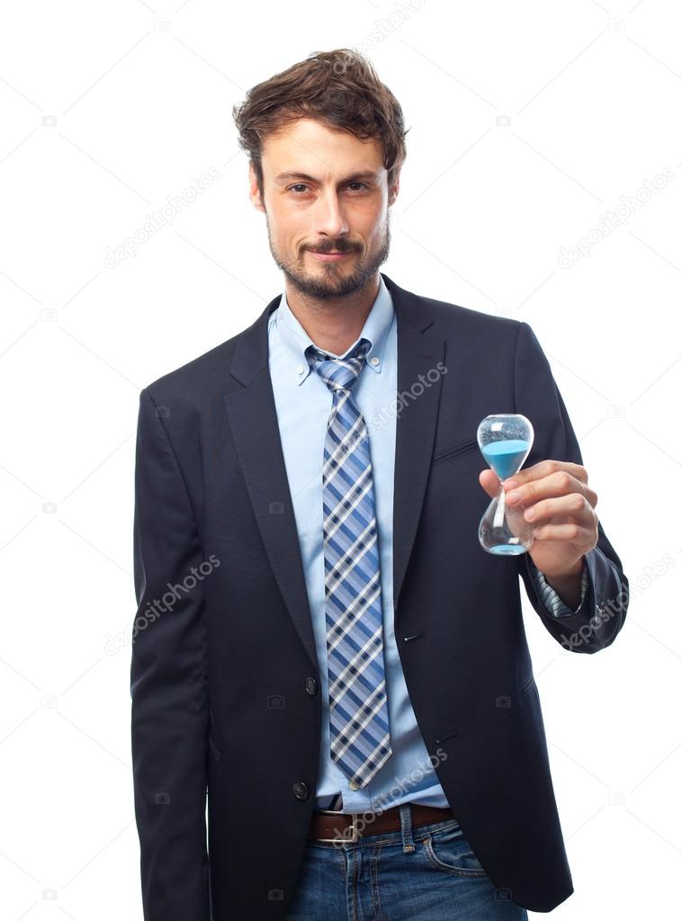 Young crazy businessman with a timer