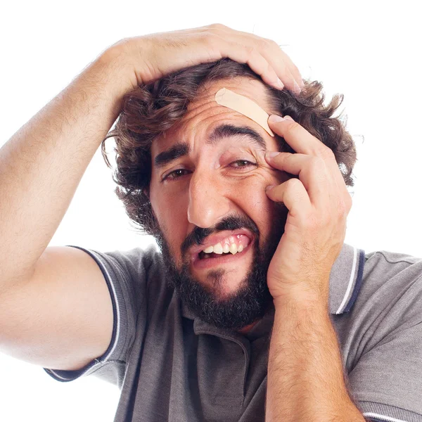 Baş ağrısı ile genç deli adam — Stok fotoğraf