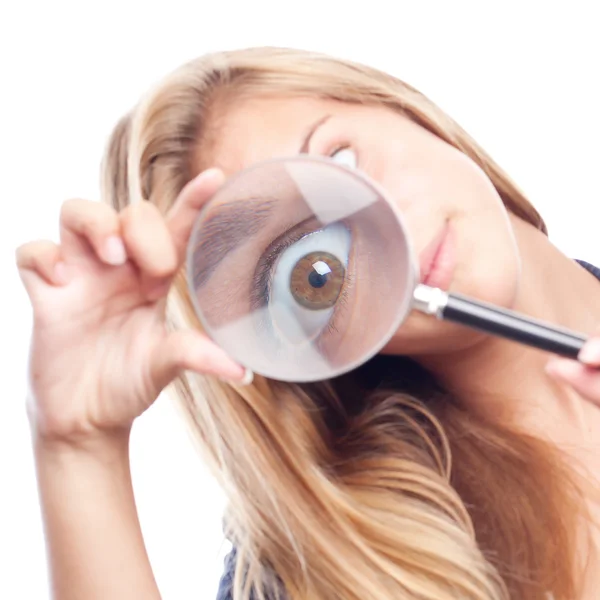 Young cool woman joking with a magnifier — Stock Photo, Image