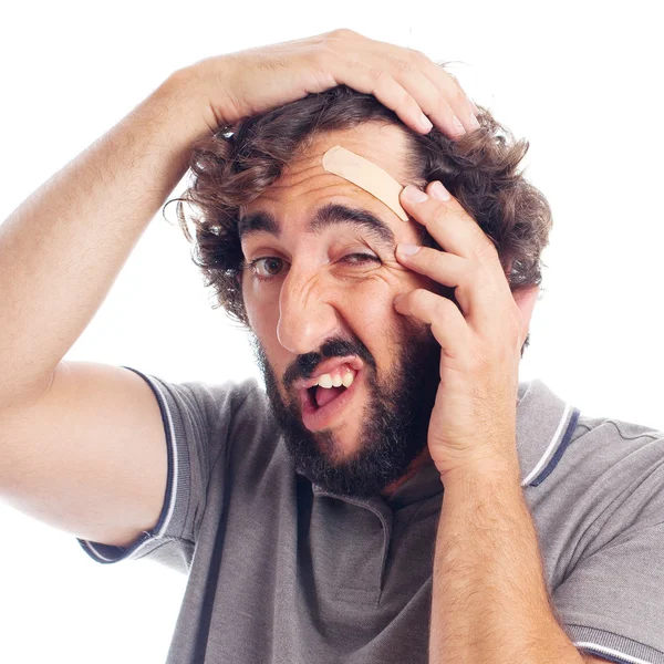 Baş ağrısı ile genç deli adam — Stok fotoğraf
