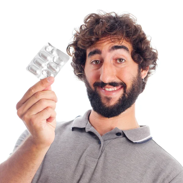 Young crazy man with pils — Stock Photo, Image