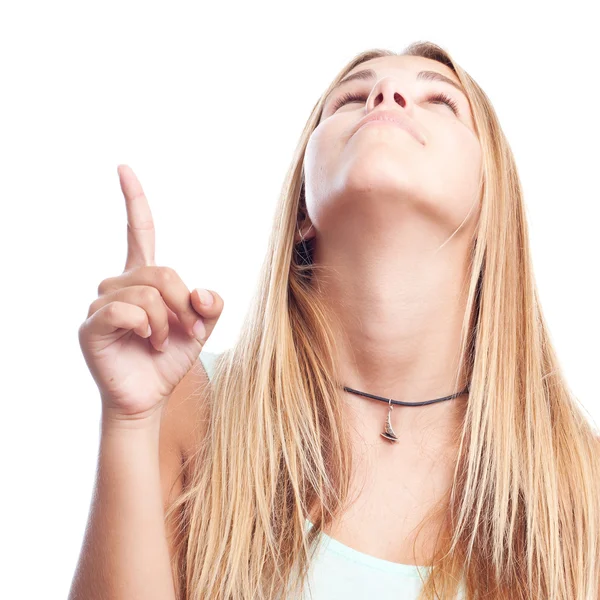 Young cool woman pointing up — Stock Photo, Image