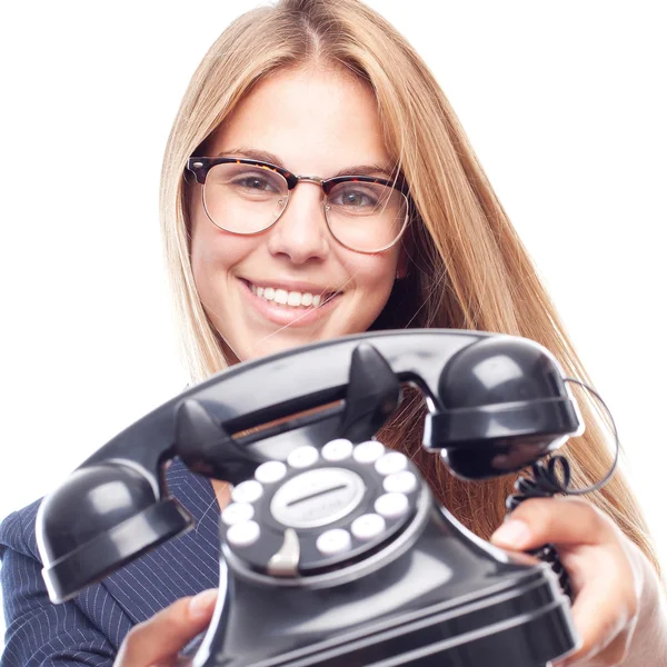 Young cool woman with a telephone — Stock Photo, Image