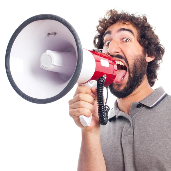 Joven loco gritando con un megáfono — Foto de Stock