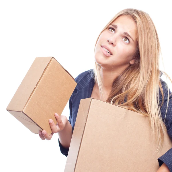 Young cool woman with boxes — Stock Photo, Image