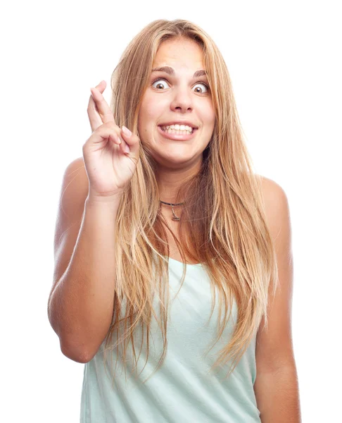 Young cool woman finger crossing — Stock Photo, Image