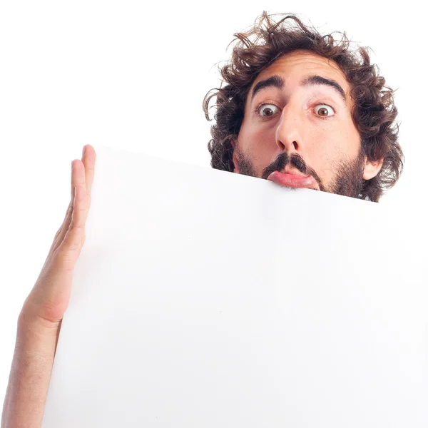 Young crazy man holding a placard — Stock Photo, Image