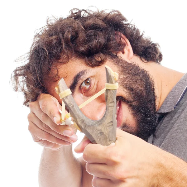 Young crazy man with a slingshot — Stock Photo, Image