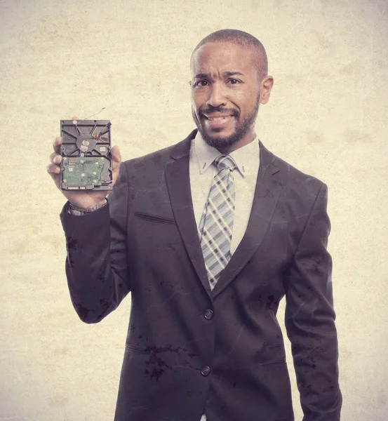 Young cool black man with a hard disk — Stock Photo, Image
