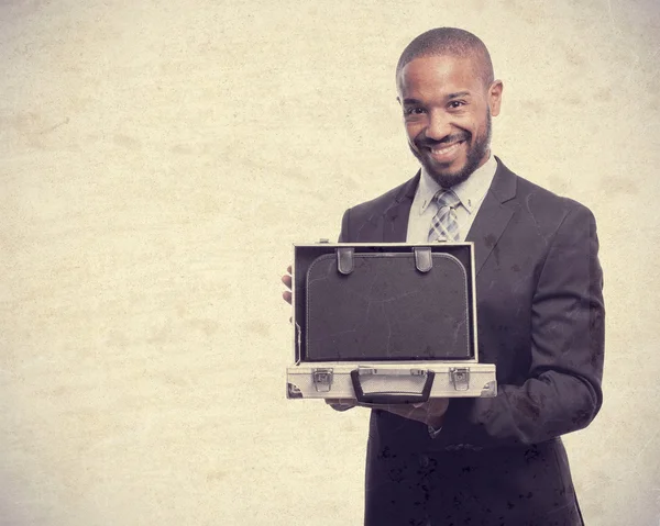 Young cool black man with a steel briefcase — Stock Photo, Image