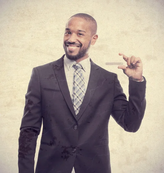 Young cool black man with a credit card — Stock Photo, Image