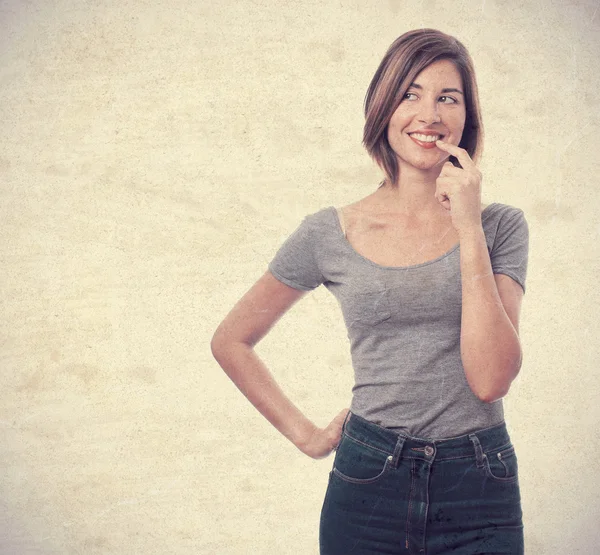 Junge coole Frau denkt — Stockfoto