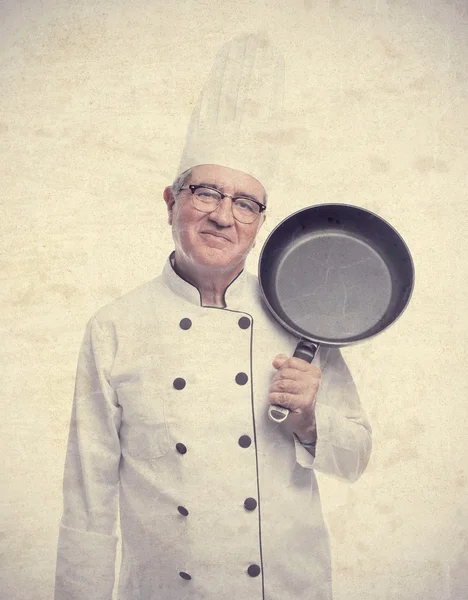 Senior cool man with a pan — Stock Photo, Image