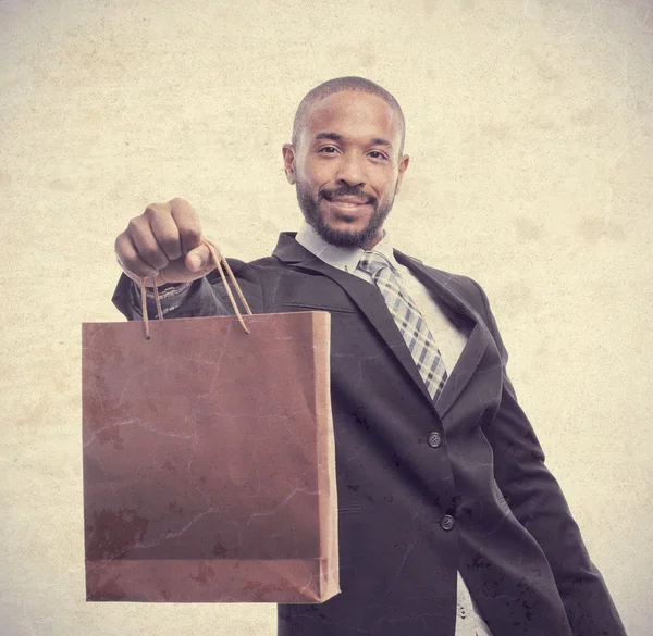 Joven fresco negro hombre con un bolso — Foto de Stock