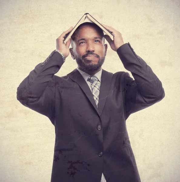 Young cool black man with a book — Stock Photo, Image