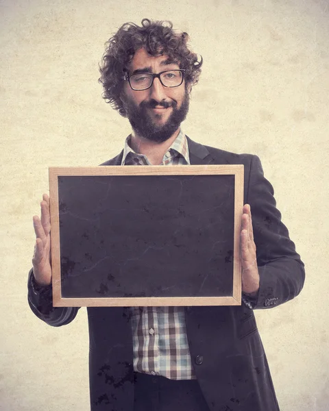 Young crazy man with blackboard — Stock Photo, Image