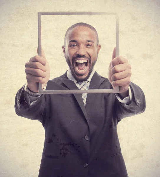 Young cool black man shouting on steel frame — Stock Photo, Image