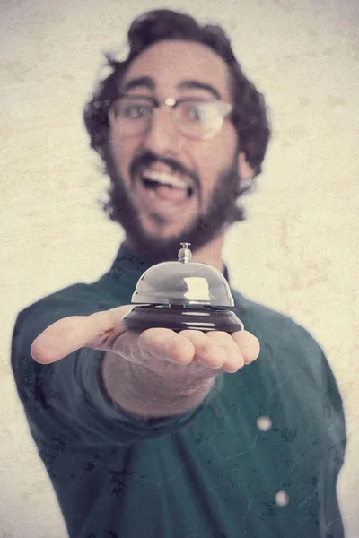 Young cool man with a bell — Stock Photo, Image