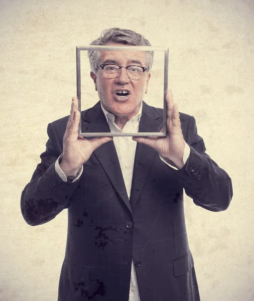 Senior cool man shouting with a steel frame — Stock Photo, Image