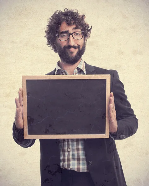 Young crazy man with blackboard Royalty Free Stock Images
