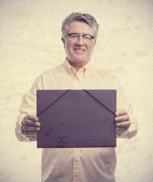 Senior cool man with a folder — Stock Photo, Image