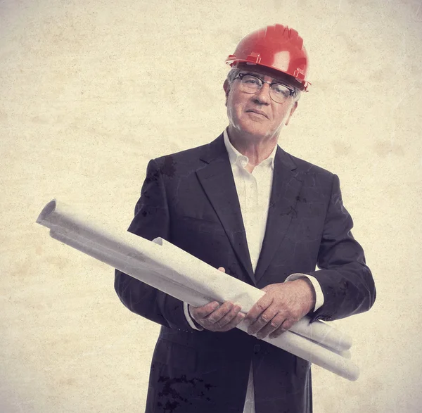 Senior onhartelijk mens architect concept — Stockfoto