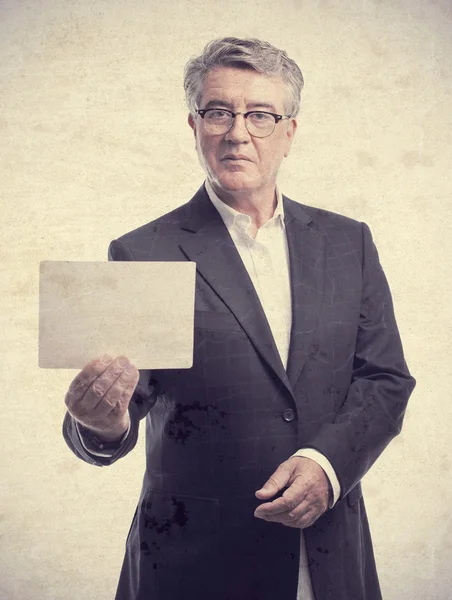 Senior cool man with a placard — Stock Photo, Image