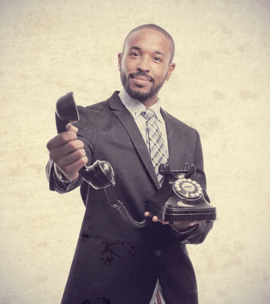 Joven fresco negro hombre ofreciendo una llamada —  Fotos de Stock