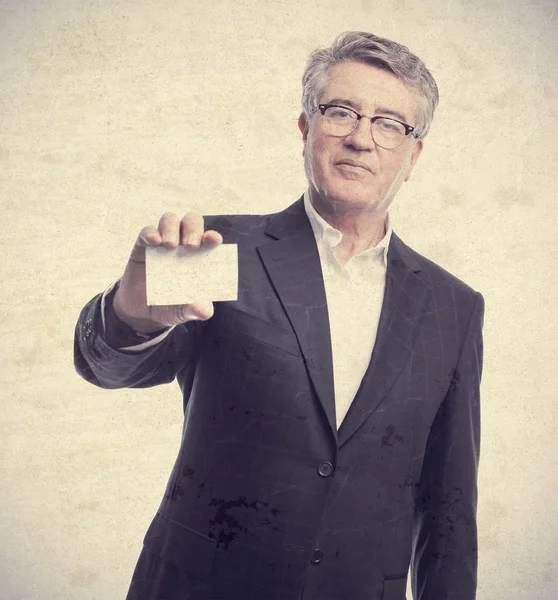 Senior cool man with a name card — Stock Photo, Image