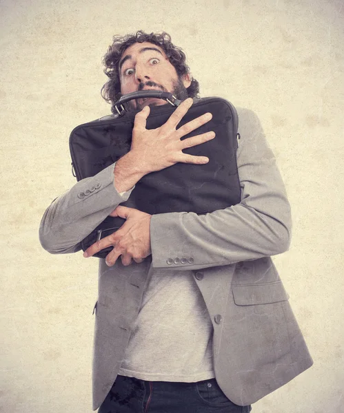 Young crazy man with a suitcase — Stock Photo, Image