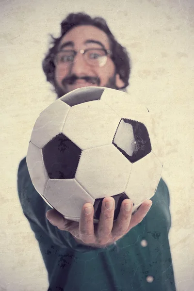 Jovem homem legal com uma bola — Fotografia de Stock
