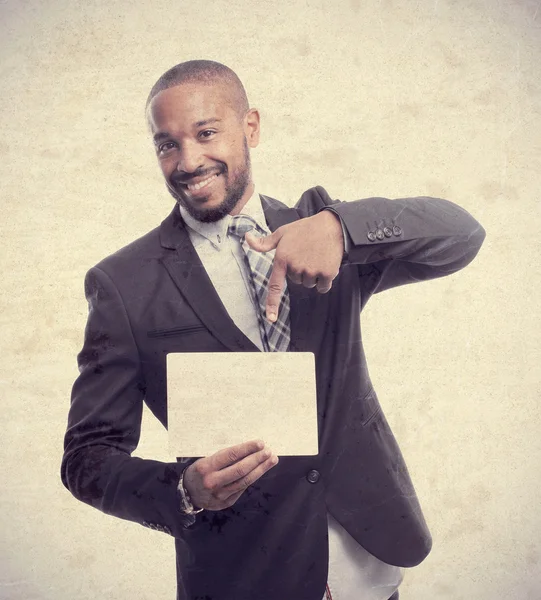 Young cool svart man med en palcard — Stockfoto