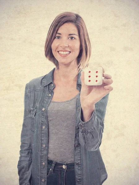 Junge coole Frau mit einem Würfel — Stockfoto