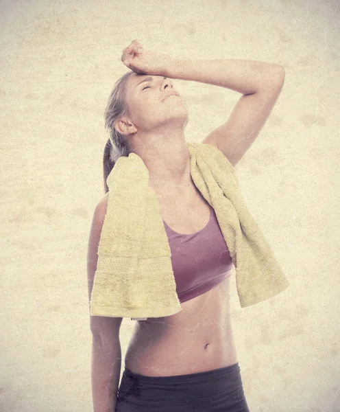 Young cool woman tired with a towel — Stock Photo, Image