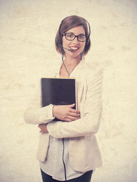 Young cool woman worker with a notebook — Stock Photo, Image