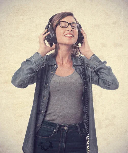 Young cool woman with headphones — Stock Photo, Image